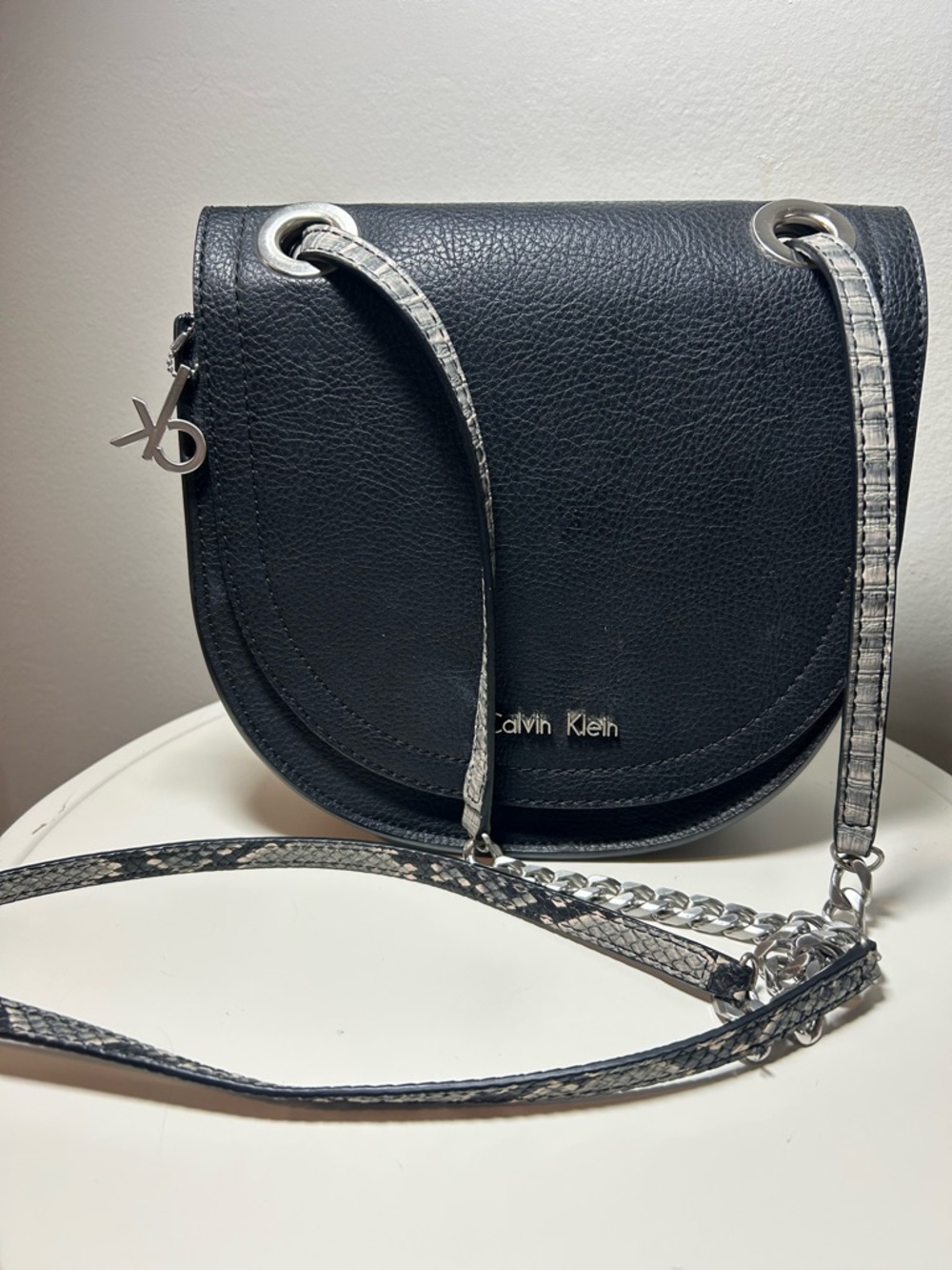Calvin Klein Black Saddle Crossbody with Silver Chain & Snake-Print Strap